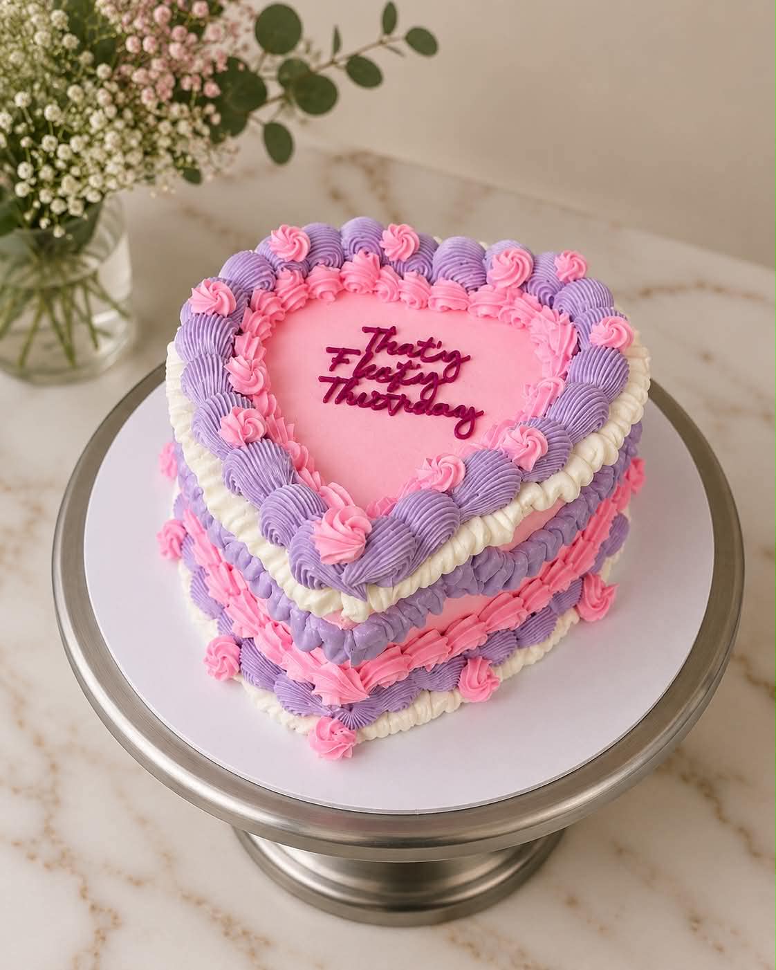 Pink and red basketball themed heart cake for Olivia's 11th birthday with Rockets jersey decoration