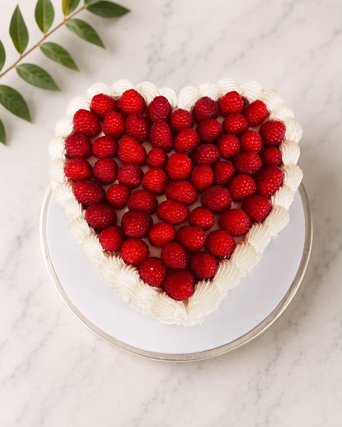 Pink heart cake with edible print reading tell Frank Ocean I ain't a kid no more