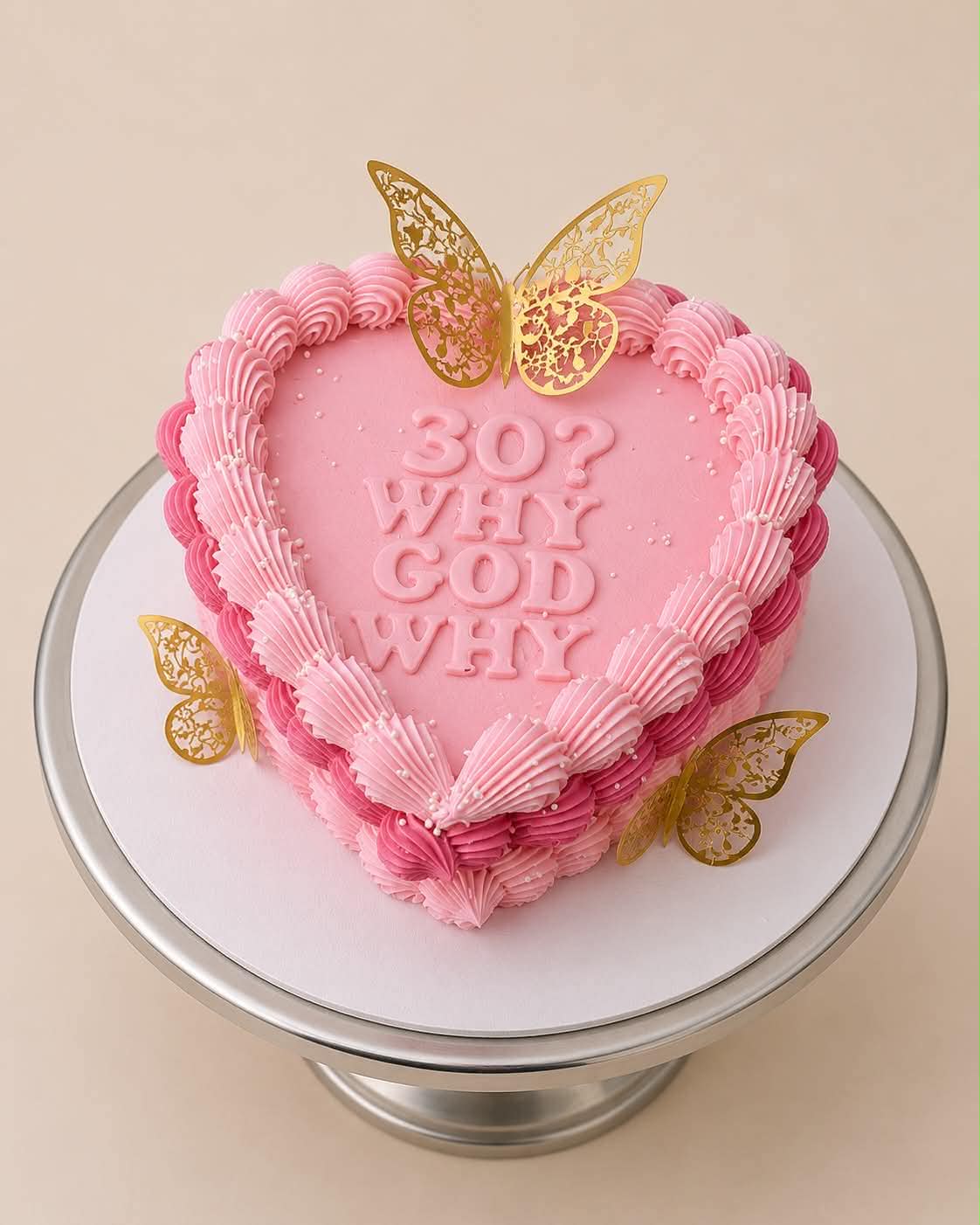 Purple, pink and white heart cake reading That's Fleaty Thursday