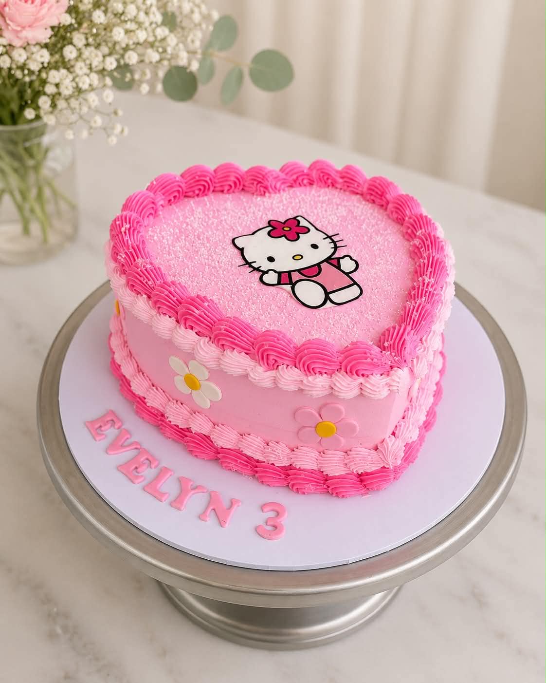 Pink and black Bratz doll edible print heart cake with black buttercream and silver cherries
