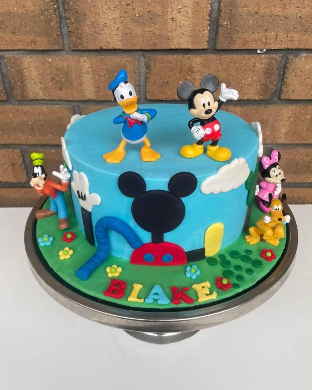 Mickey Mouse Clubhouse birthday cake for Blake with Mickey, Minnie, Donald, Goofy and Pluto figurines
