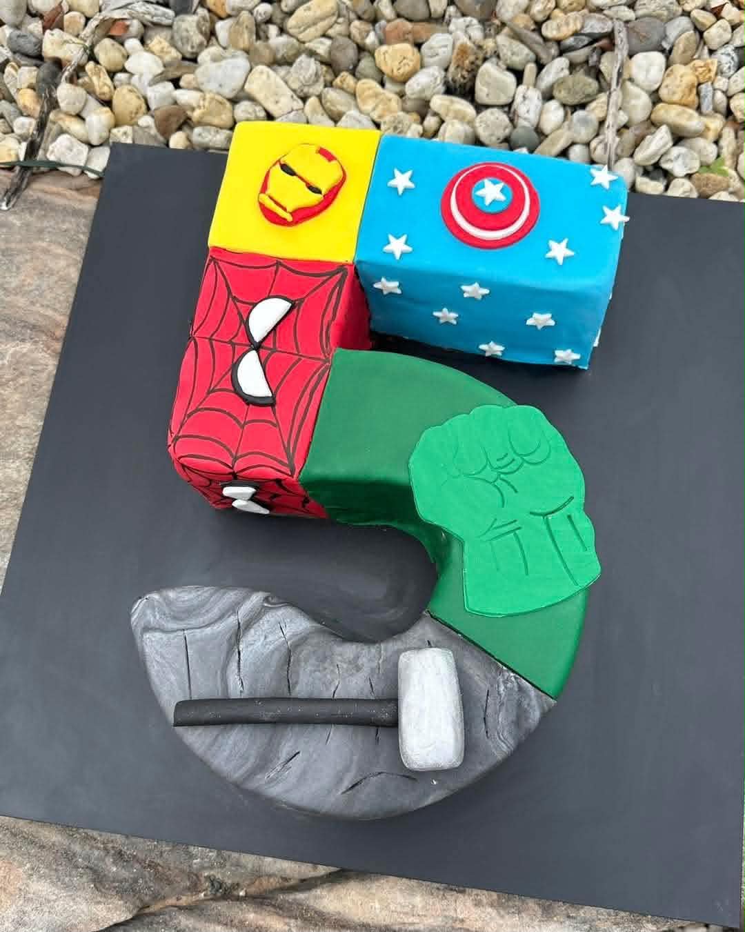 Number 5 shaped superhero cake with Iron Man, Captain America, Spiderman, Hulk and Thor fondant sections