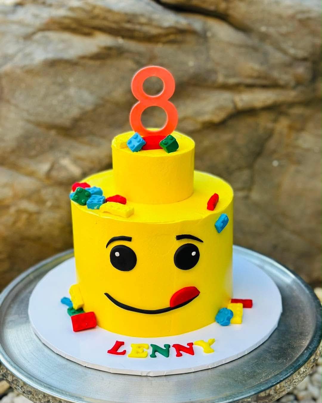 Blue robot birthday cake for Hunter's 4th with robot figurines, gear toppers and colourful ball garland